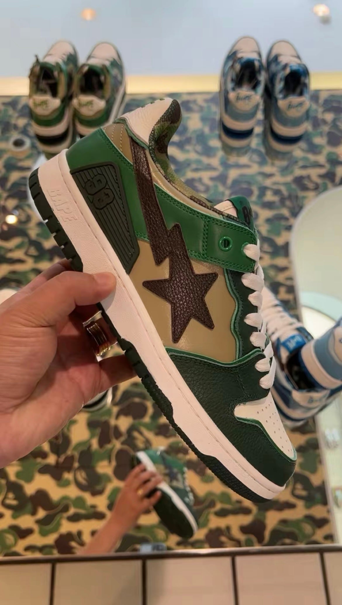 BAPE SK8 STA Low-Cut Sneakers in Green Camo - product image from the listing.