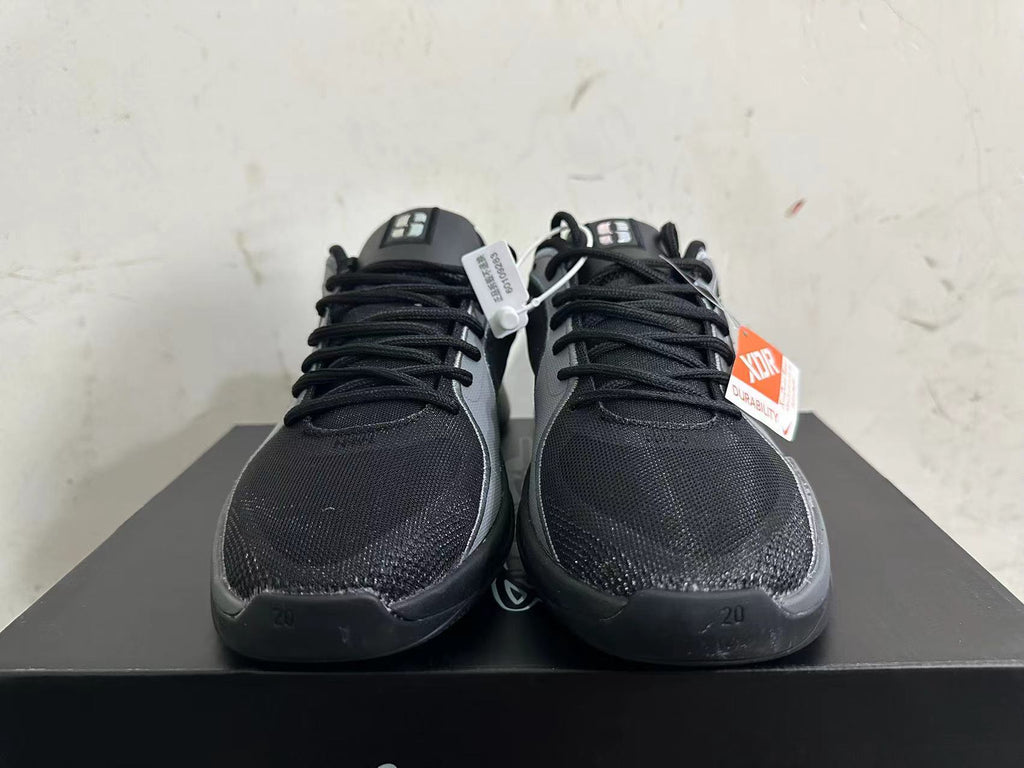 Nike Kobe 5 Basketball Shoes in Black and Grey - product image from the listing.