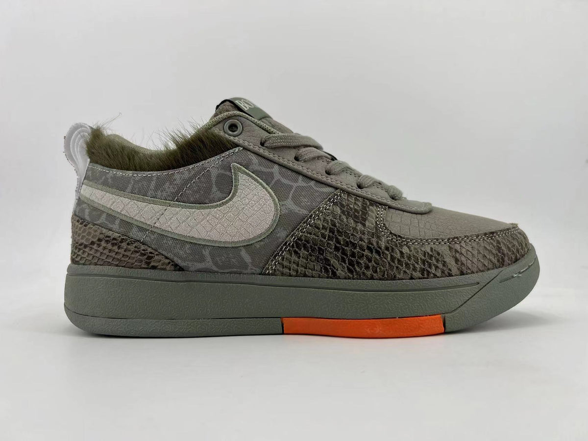 Gray and Orange Nike HF6236-002 Low-Top Sneakers - product image from the listing.