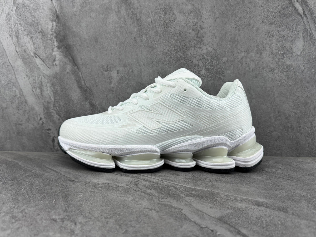 New Balance White Trainers with Segmented Sole - product image from the listing.