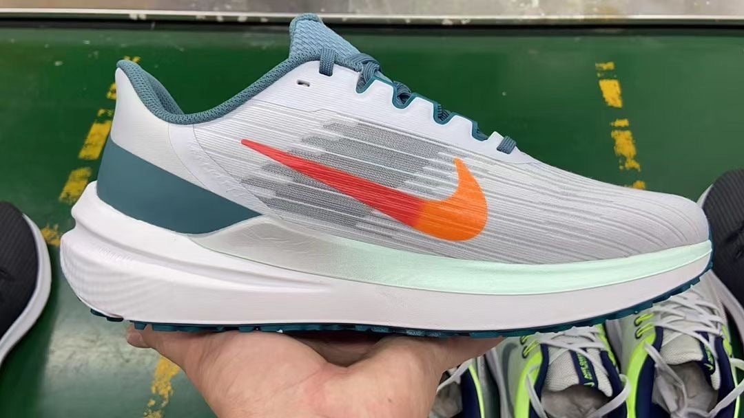 Nike Air Winflo 9 Running Shoes DD6203-005 in Gray Blue - product image from the listing.