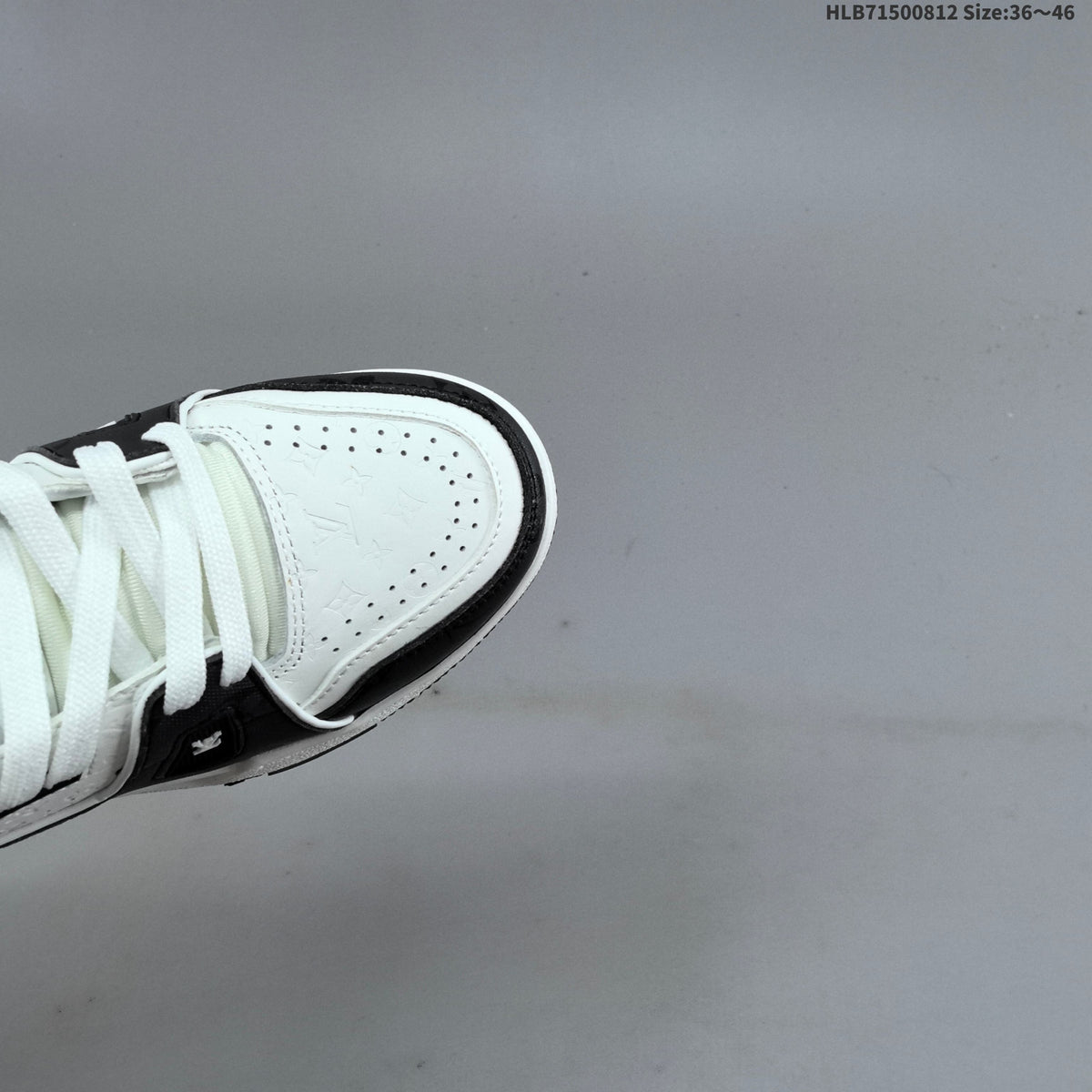 Louis Vuitton Low-Top Sneakers in White and Black - product image from the listing.