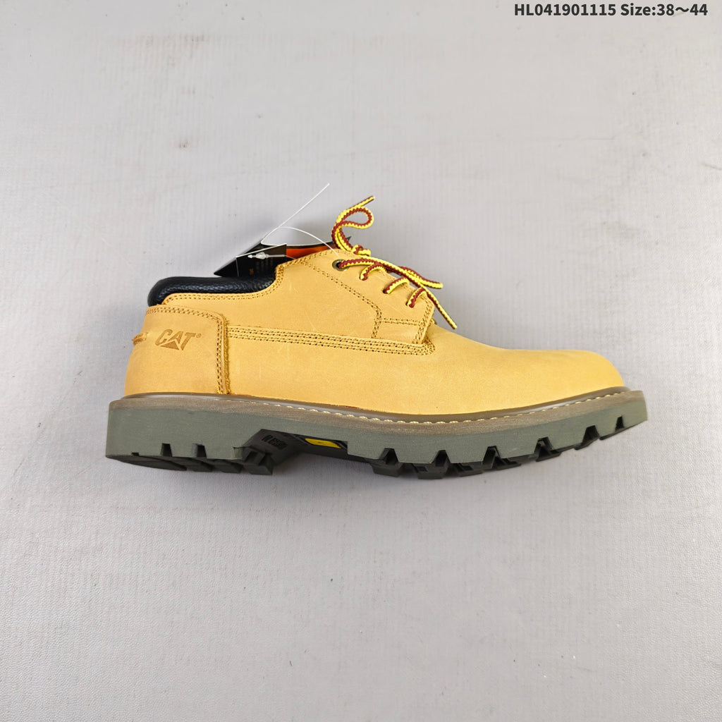CAT Low-Top Lace-Up Work Boots in Honey in Yellow - product image from the listing.