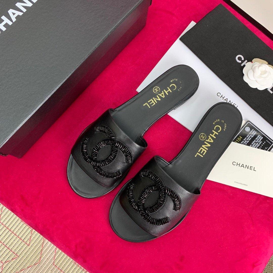 Sandals by Chanel - product photo shown in the listing for this item.