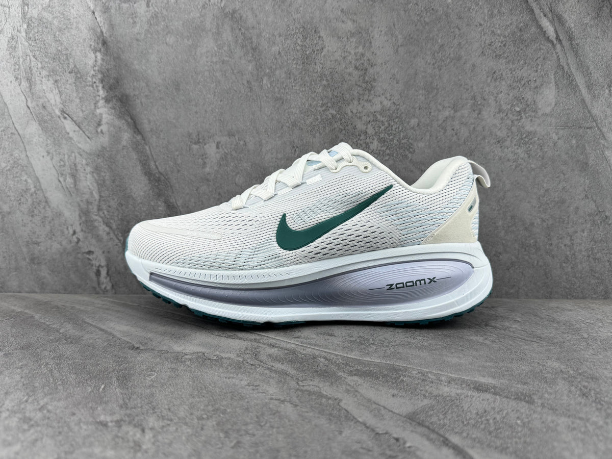 Nike ZoomX Running Sneakers in White - product image from the listing.