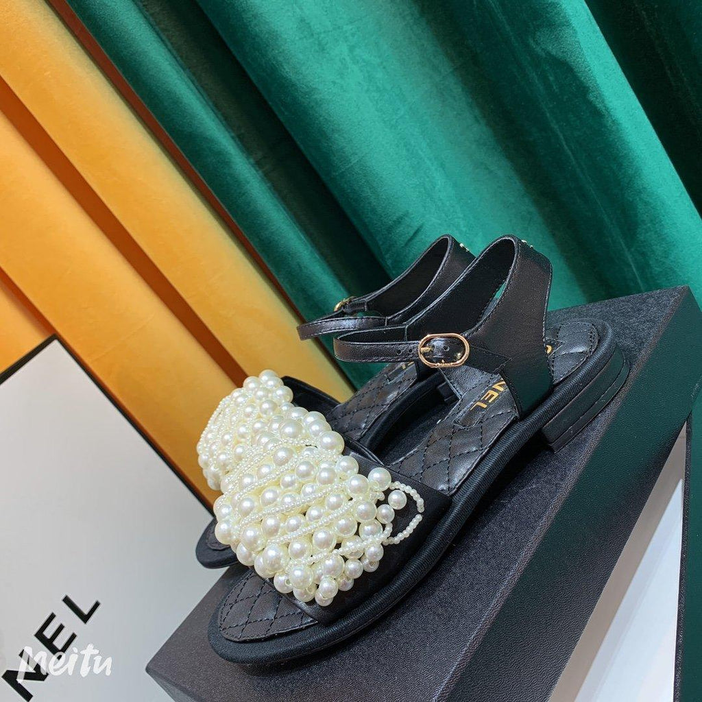 Sandals by Chanel - product photo shown in the listing for this item.