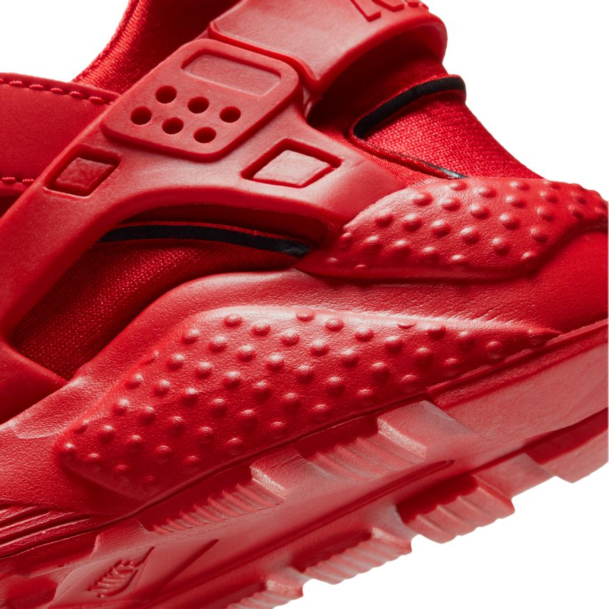 Nike Air Huarache in Red - product photo shown in the listing for this item.