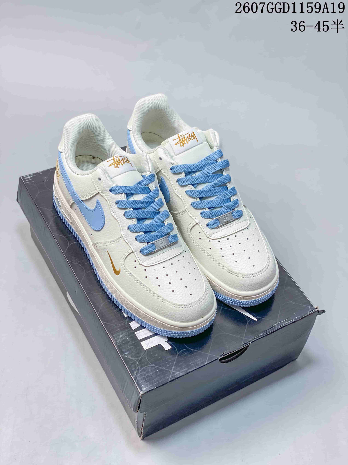 Nike Air Force 1 '07 Low Sneakers in White Light Blue - product image from the listing.