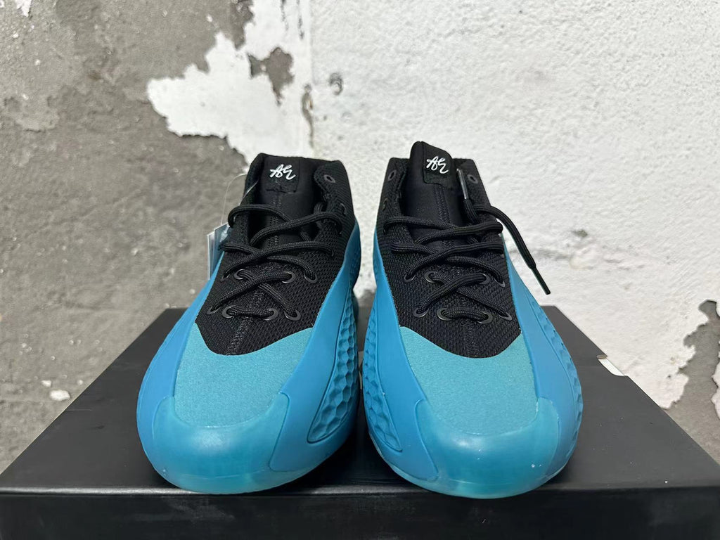 Black and Blue adidas Basketball Shoes - product image from the listing.