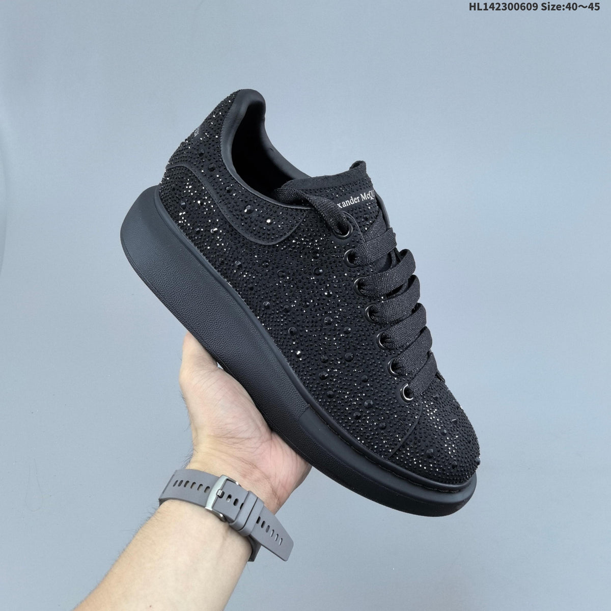 Alexander McQueen Black Crystal-Embellished Sneakers in Leather - product image from the listing.