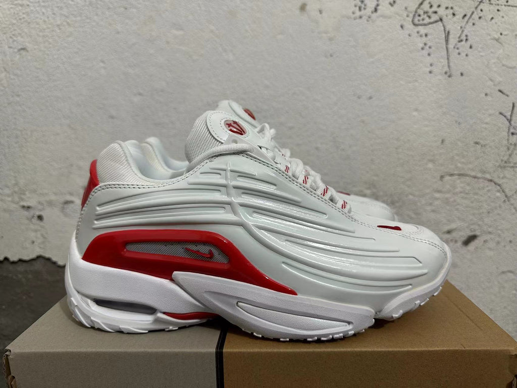 White and Red Athletic Trainers - product image from the listing.