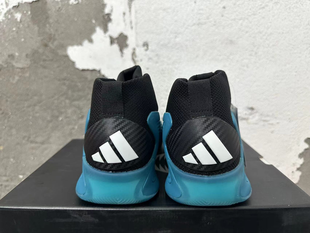 Black and Blue adidas Basketball Shoes - product image from the listing.