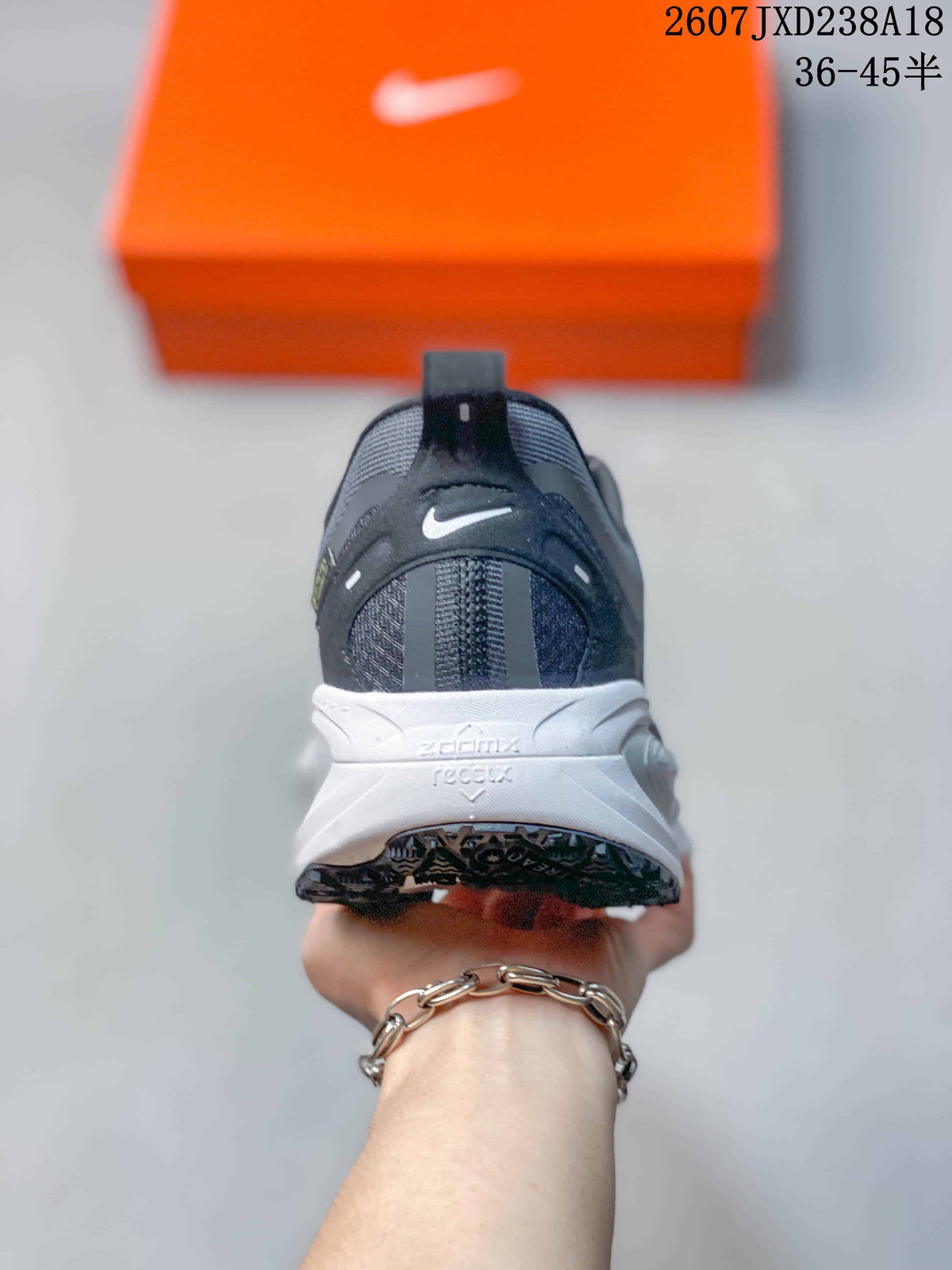 Nike Vomero 18 GTX Running Shoes in Dark Gray White - product image from the listing.