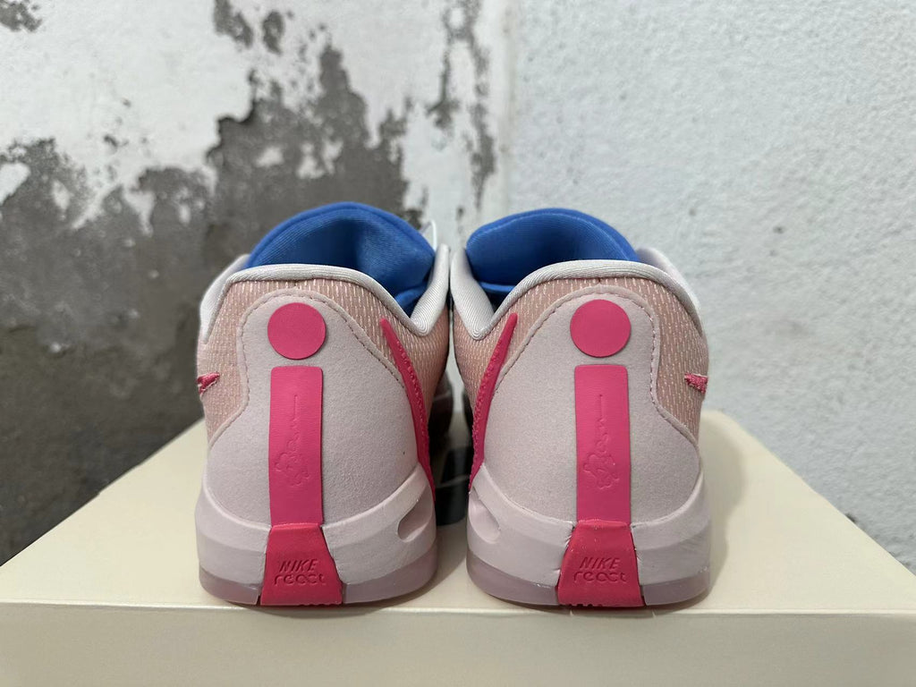 Nike Kobe 5 Protro Basketball Shoes in Blue and Pink - product image from the listing.