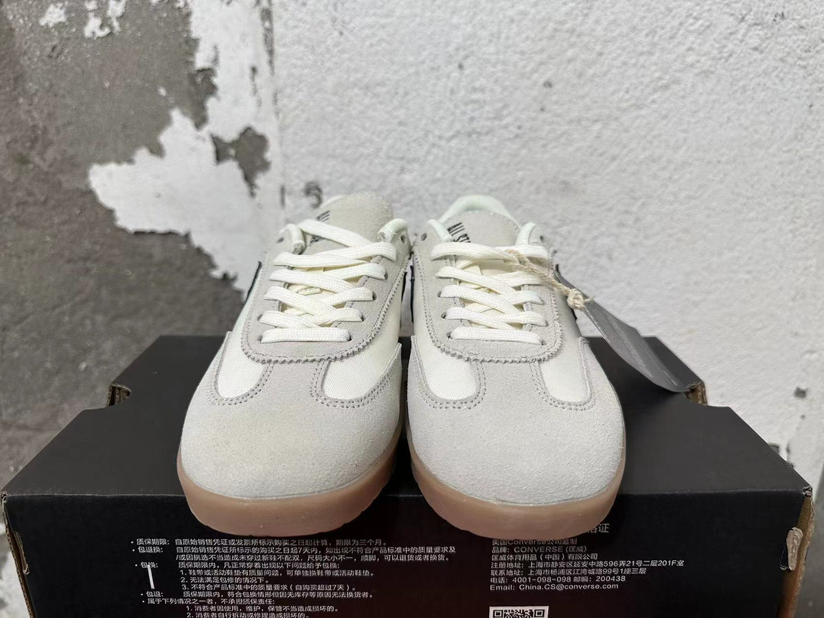 Cream and Black Converse Trainer-Style Sneakers - product image from the listing.