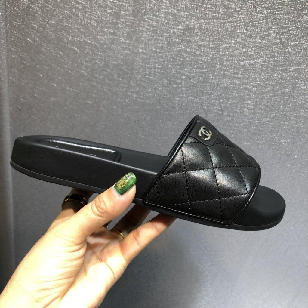 Chanel quilted slides in Black - product image from the listing.