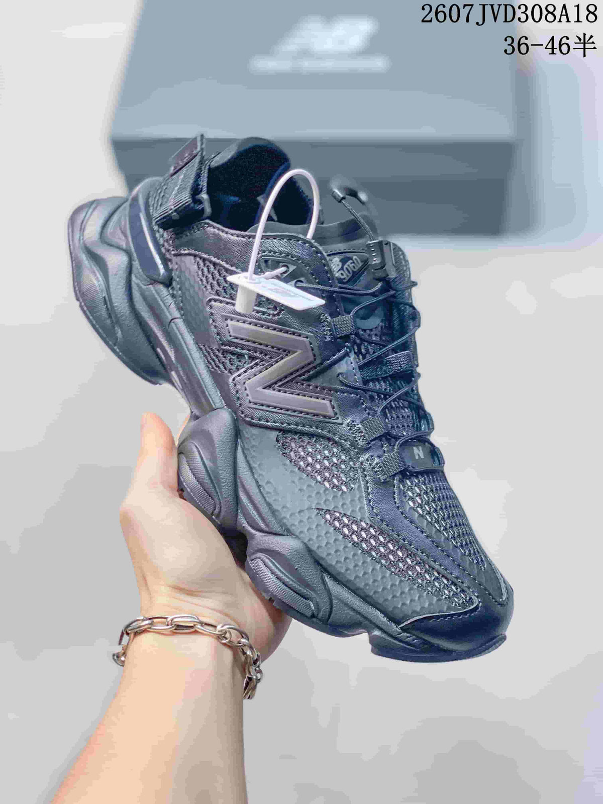 New Balance 9060 Sneakers in Dark Grey 2607JVD308A18 - product image from the listing.