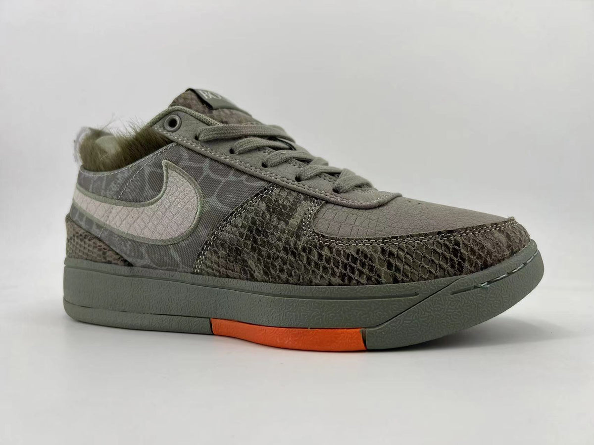 Gray and Orange Nike HF6236-002 Low-Top Sneakers - product image from the listing.