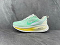 Nike ZoomX Running Shoes in Mint Green - product image from the listing.