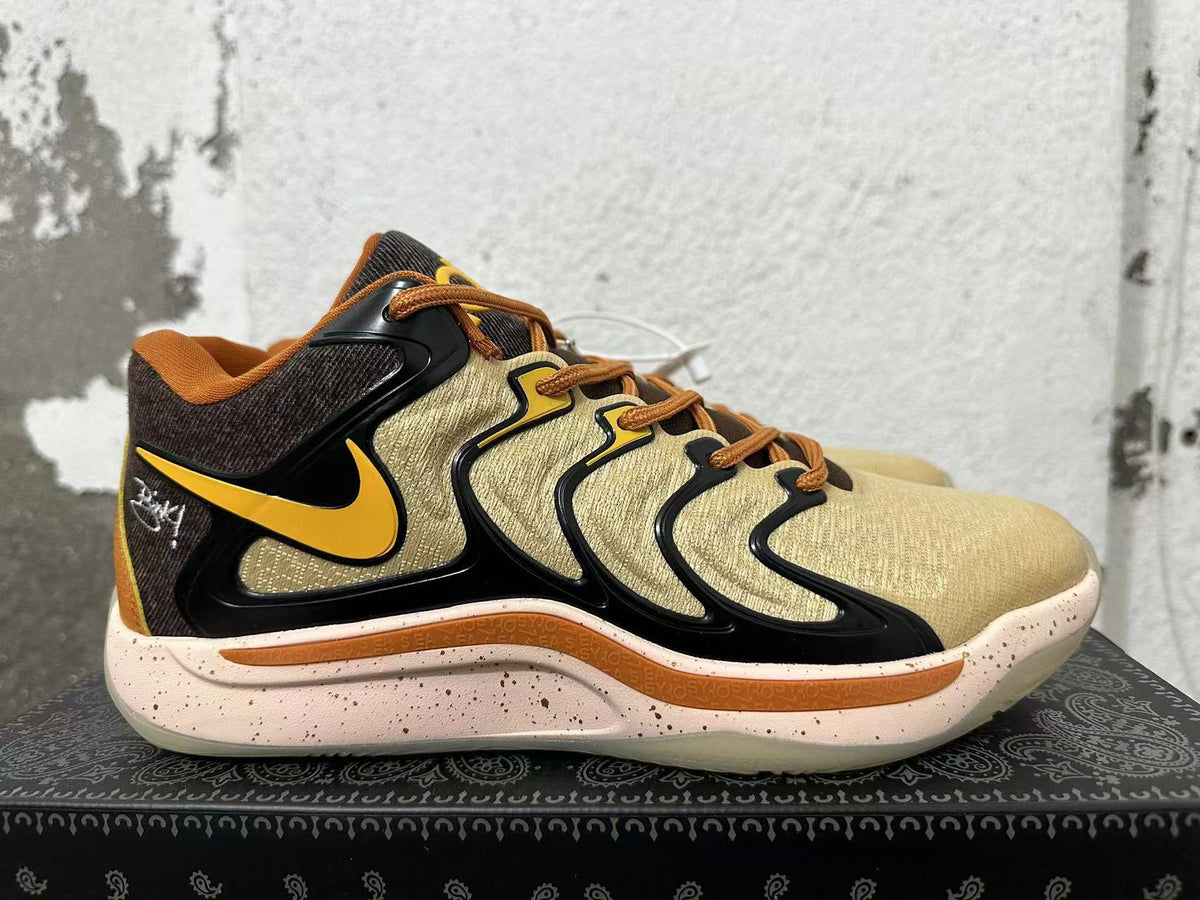 Nike Zoom Freak 5 Basketball Shoes in Yellow - product image from the listing.