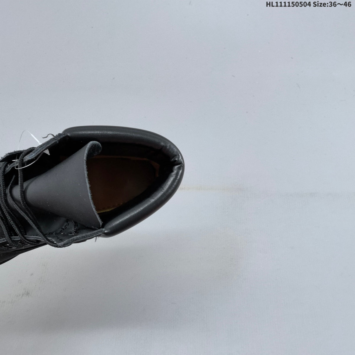 Black 6-Inch Lace-Up Boots by Timberland - product image from the listing.
