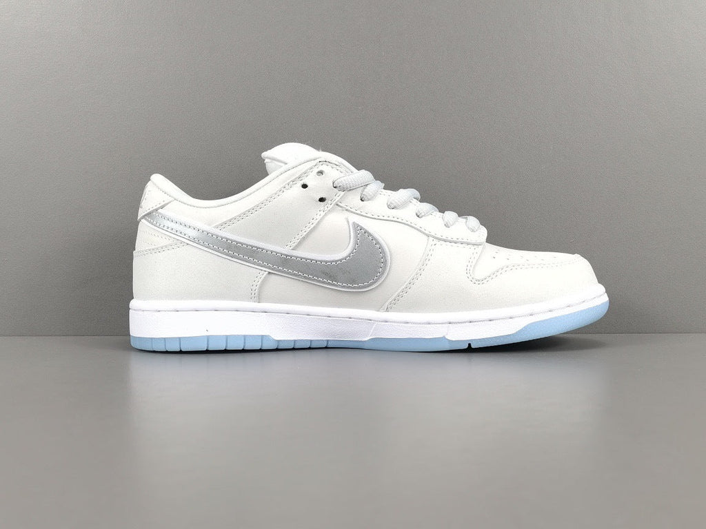 Nike Dunk Low SB Purple Lobster Sneakers in White FD8776-100 - product image from the listing.