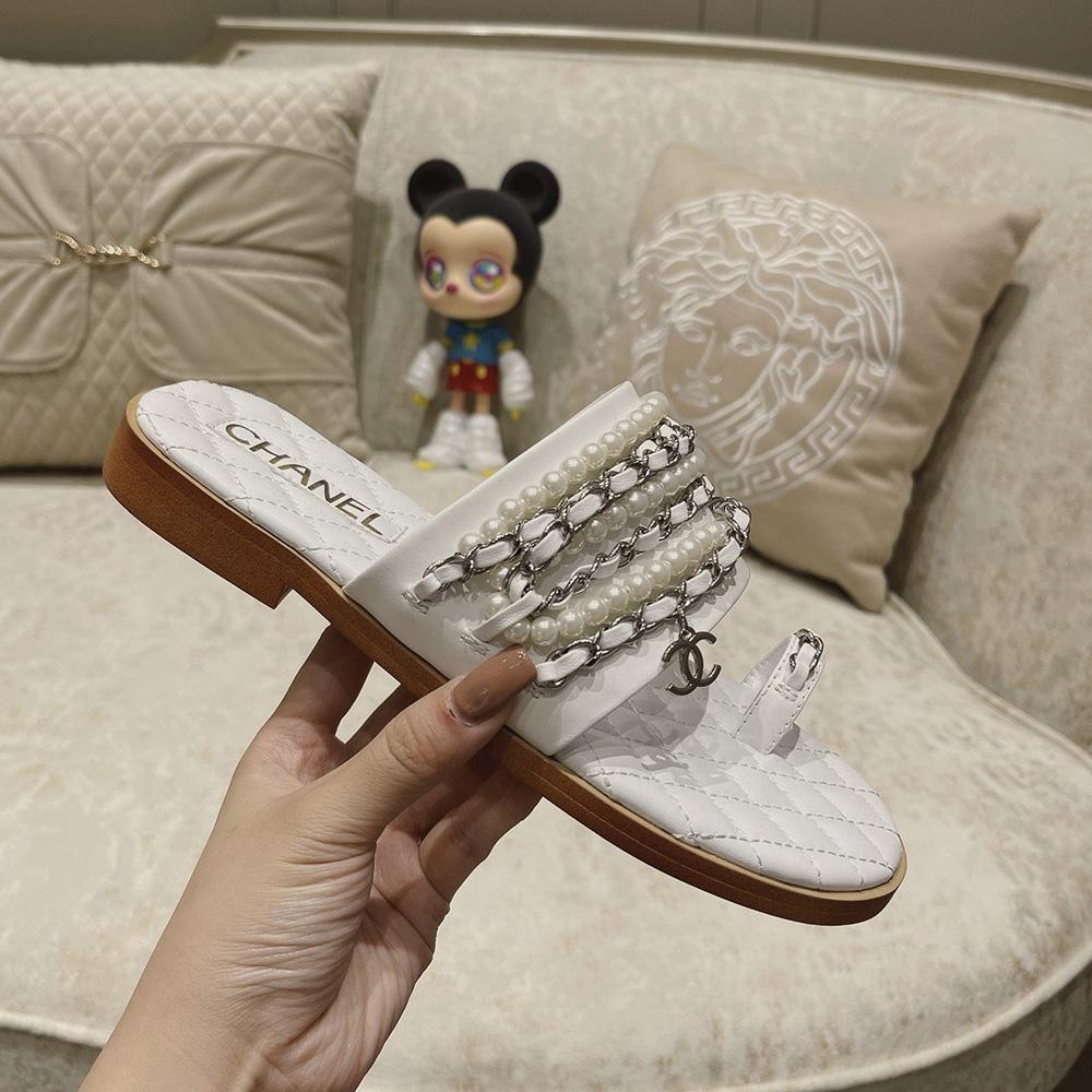 Sandals by Chanel - product photo shown in the listing for this item.