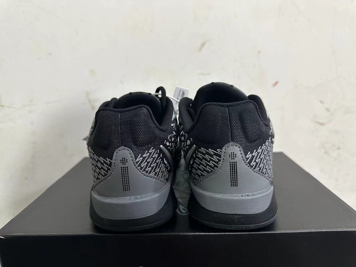 Nike Kobe 5 Basketball Shoes in Black and Grey - product image from the listing.