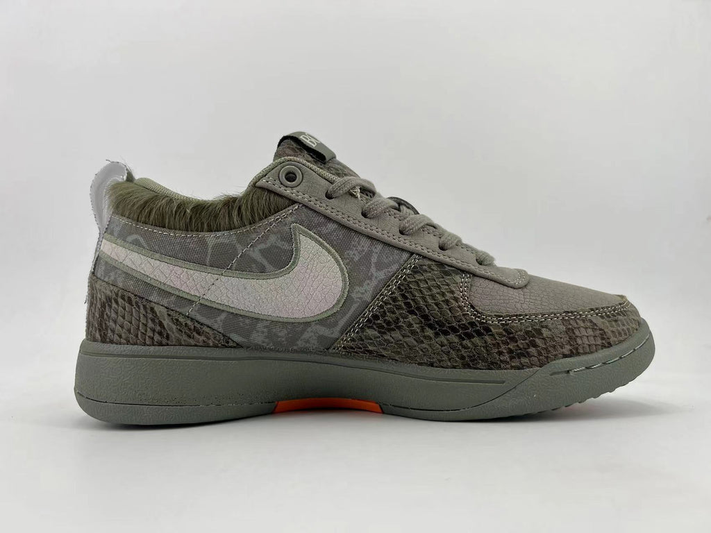 Gray and Orange Nike HF6236-002 Low-Top Sneakers - product image from the listing.