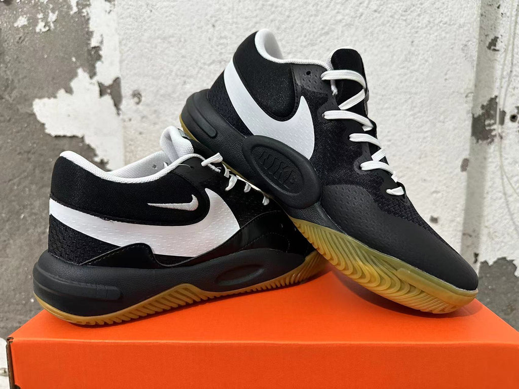 Nike Black and White Gum Sole Trainers - product image from the listing.