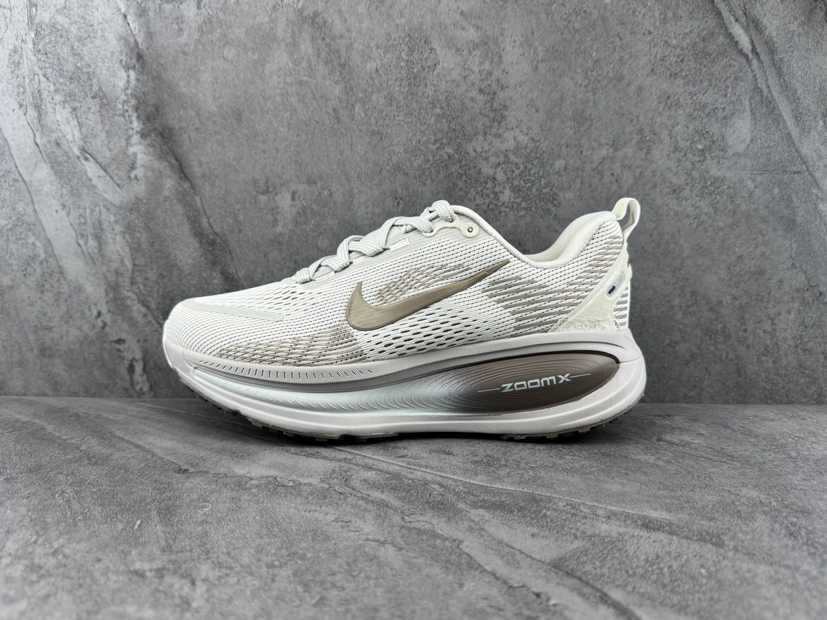 White Nike ZoomX Running Shoes - product image from the listing.