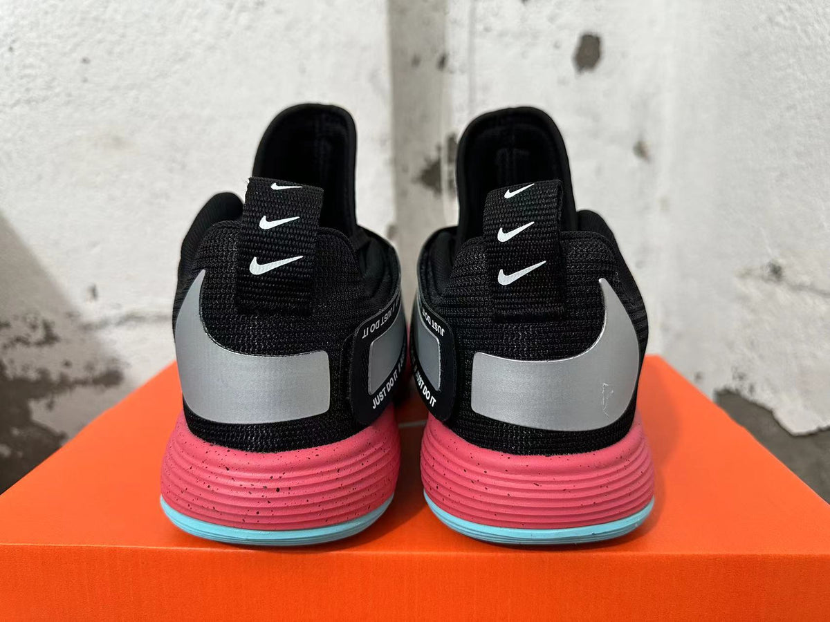 Nike Hyperdunk Basketball Shoes in Black Blue Pink - product image from the listing.