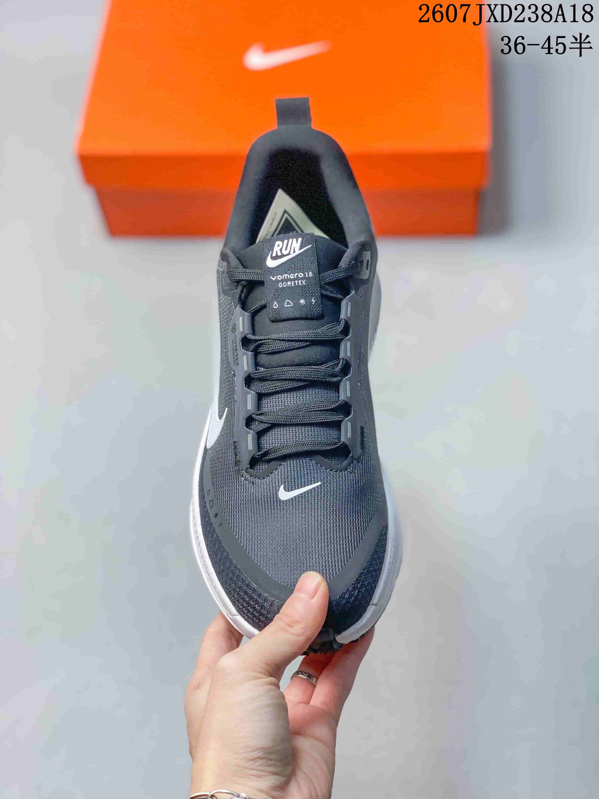 Nike Vomero 18 GTX Running Shoes in Dark Gray White - product image from the listing.