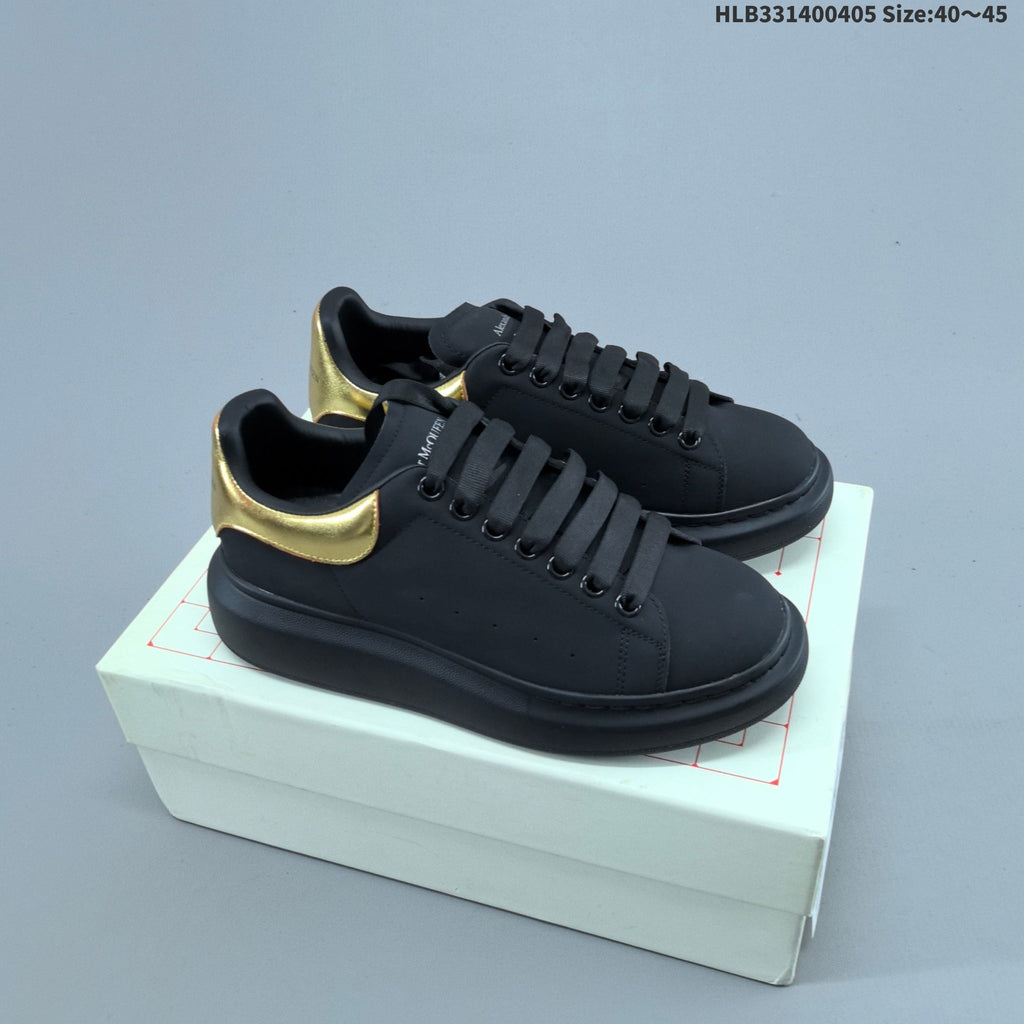 Alexander McQueen Oversized Low-Cut Sneakers, Black and Gold, HLB331400405 - product image from the listing.