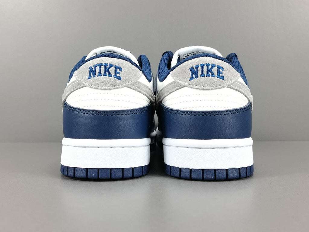 Nike Dunk Low Sneakers in Midnight Navy FD9749-400 - product image from the listing.