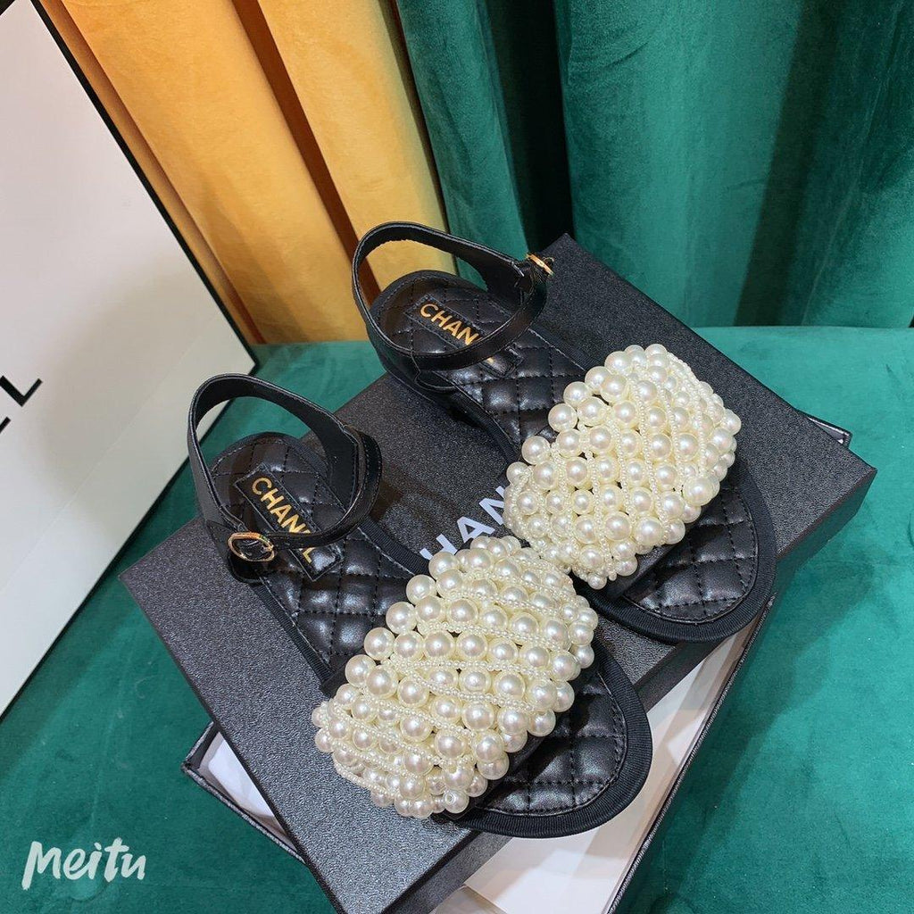 Sandals by Chanel - product photo shown in the listing for this item.