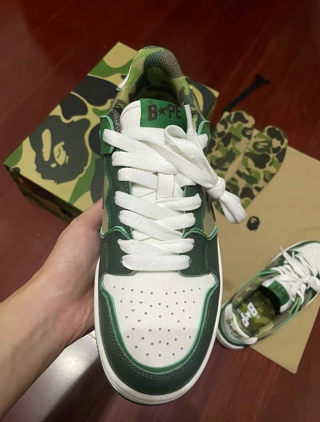 BAPE SK8 STA Low-Cut Sneakers in Green Camo - product image from the listing.