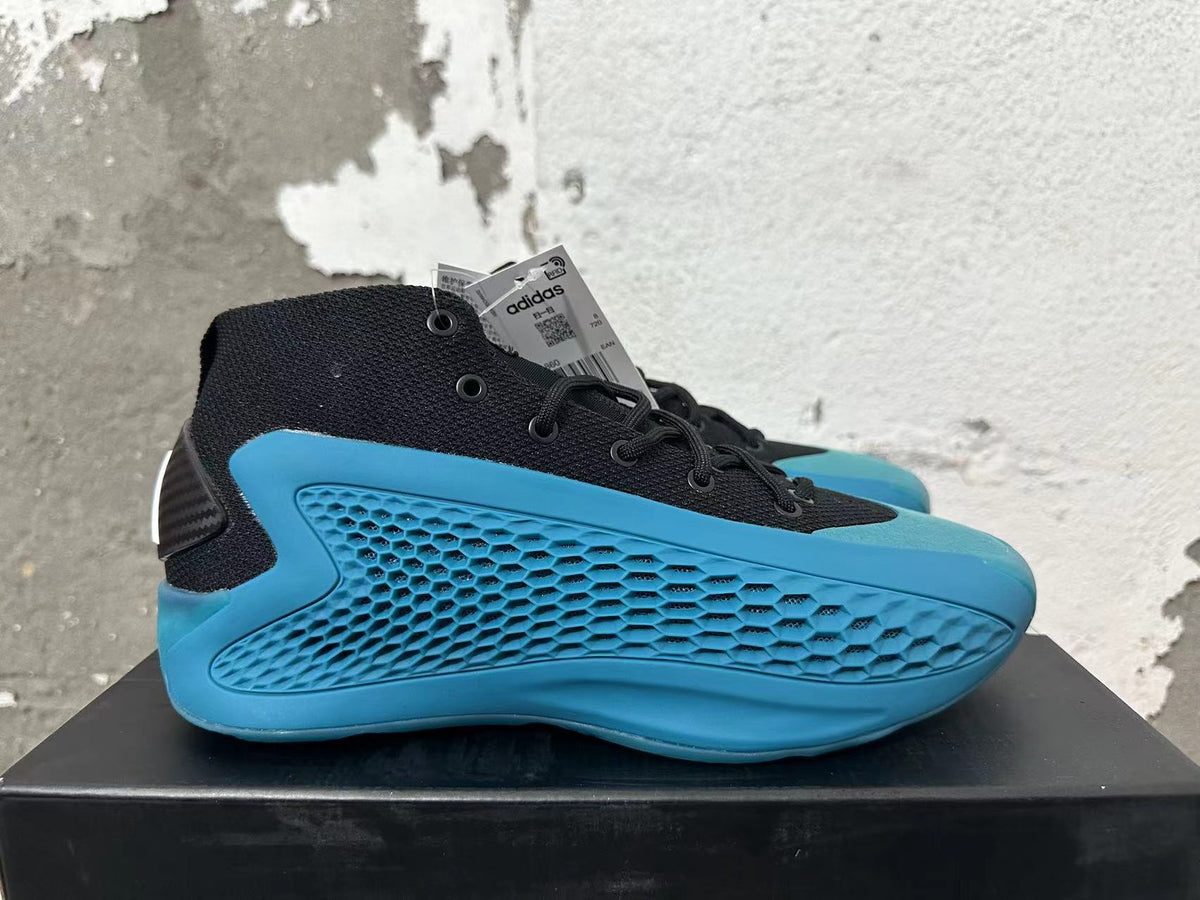 Black and Blue adidas Basketball Shoes - product image from the listing.