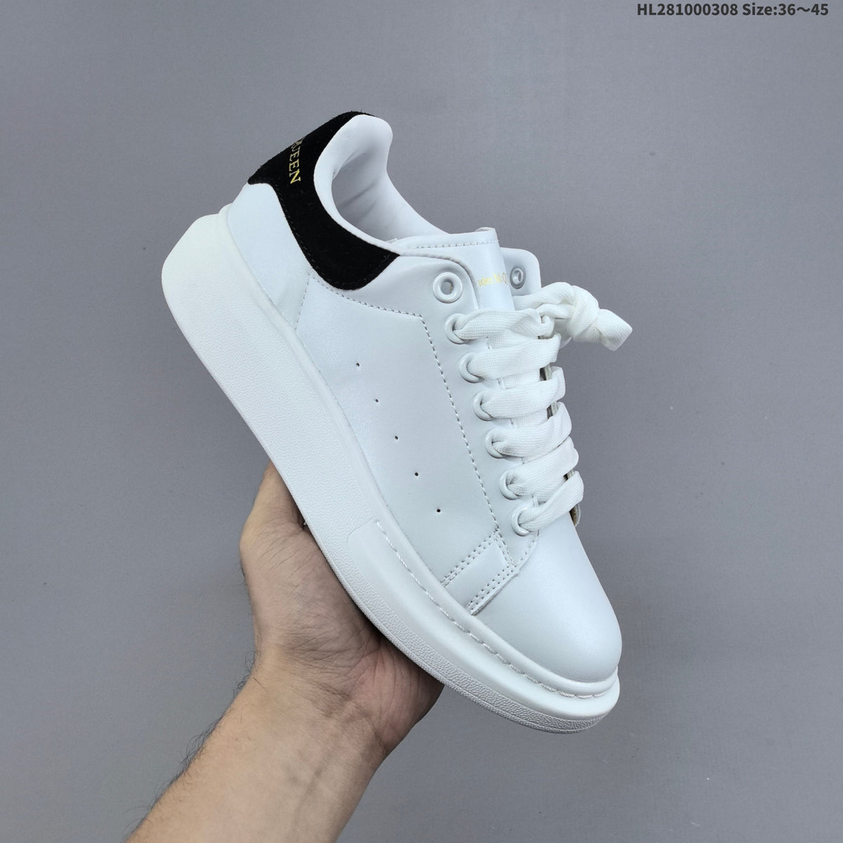 Alexander McQueen Oversized Low-Top Sneakers, in White and Black HL281000308 - product image from the listing.