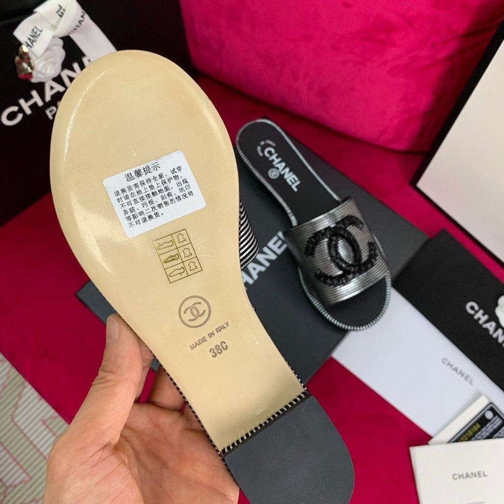 Sandals by Chanel - product photo shown in the listing for this item.