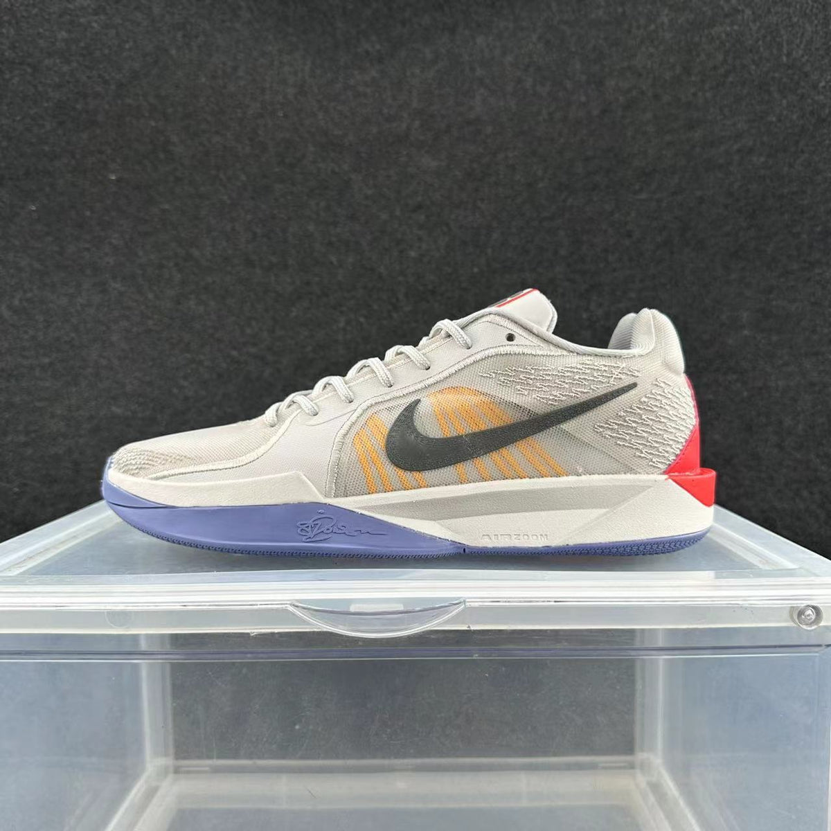 Nike Zoom Basketball Shoes in Off-White and in Purple - product image from the listing.