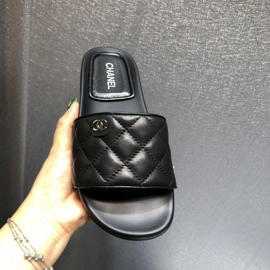 Chanel quilted slides in Black - product image from the listing.