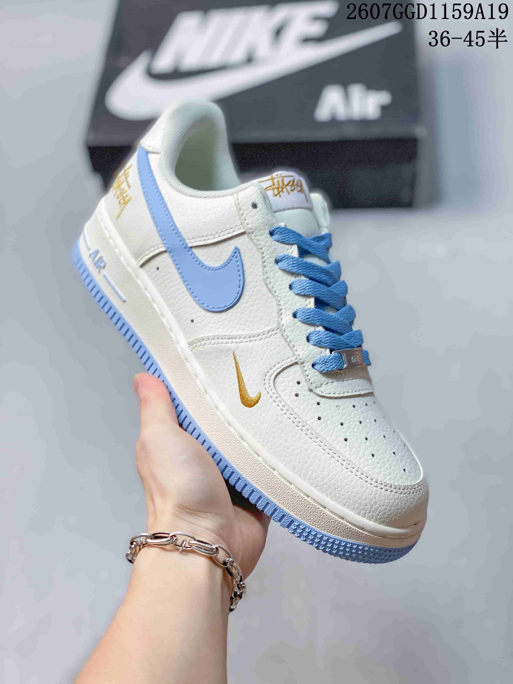 Nike Air Force 1 '07 Low Sneakers in White Light Blue - product image from the listing.