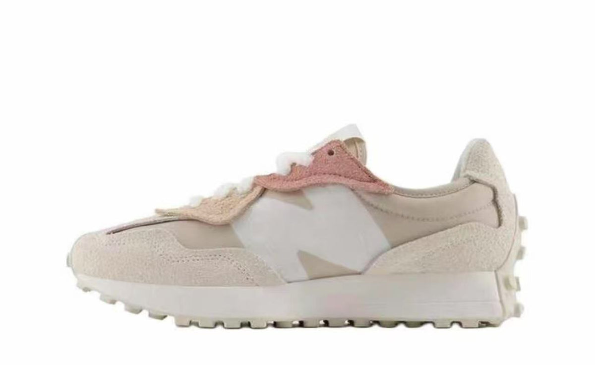 Women's New Balance U327WTL Sneakers in Beige and Pink - product image from the listing.