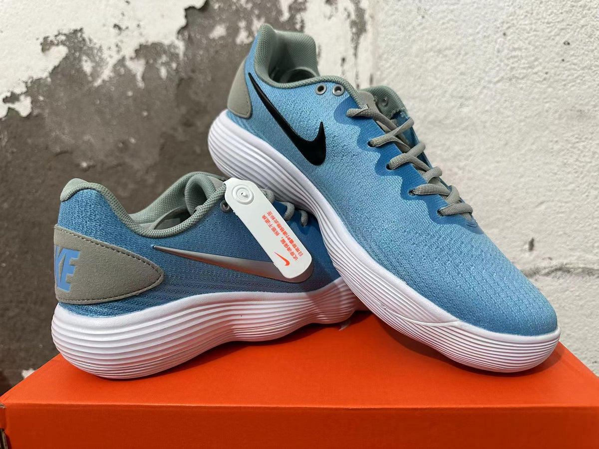 Nike Blue and White Lace-Up Trainers - product image from the listing.