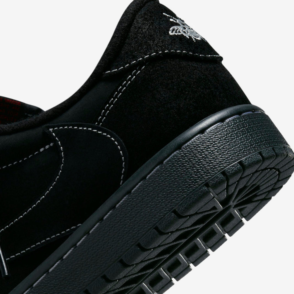 Jordan 1 Low OG Travis Scott Sneakers in Black DM7866-001 - product image from the listing.