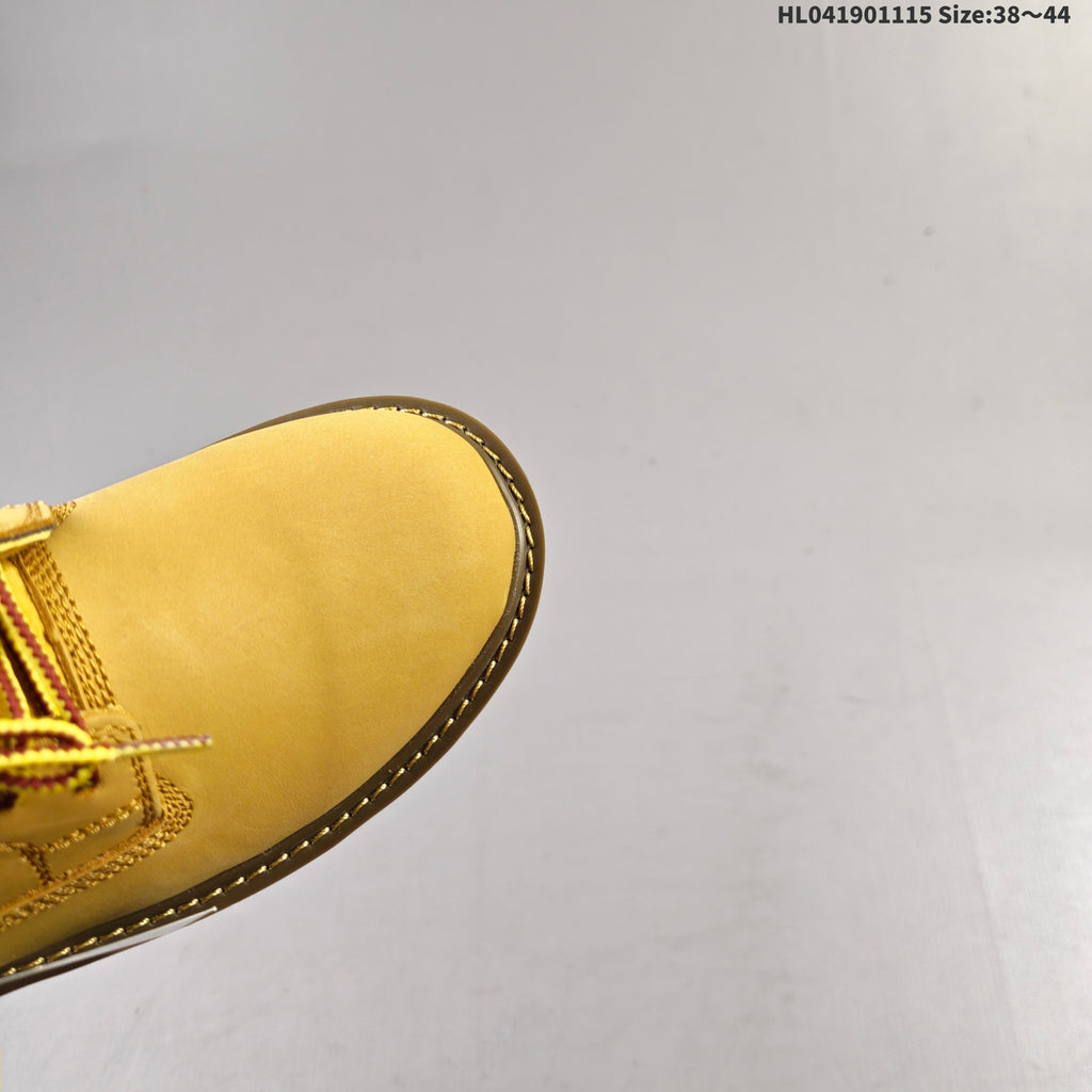 CAT Low-Top Lace-Up Work Boots in Honey in Yellow - product image from the listing.