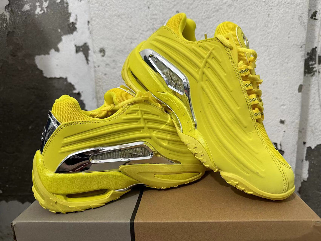 NOCTA Low-Top Sneakers in Yellow - product image from the listing.