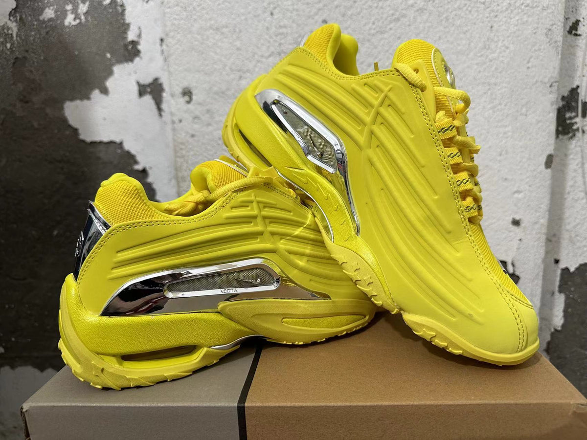 NOCTA Low-Top Sneakers in Yellow - product image from the listing.