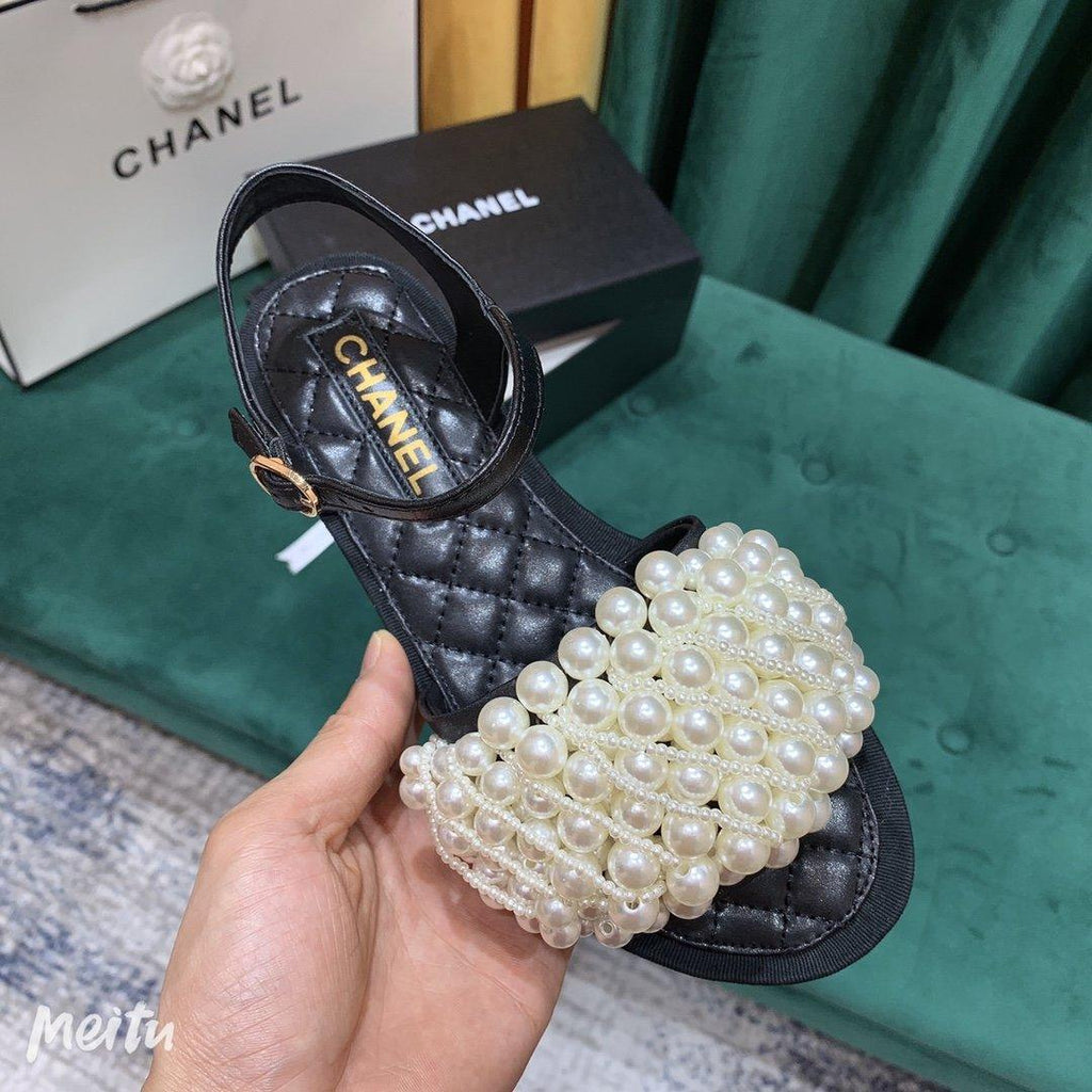 Sandals by Chanel - product photo shown in the listing for this item.